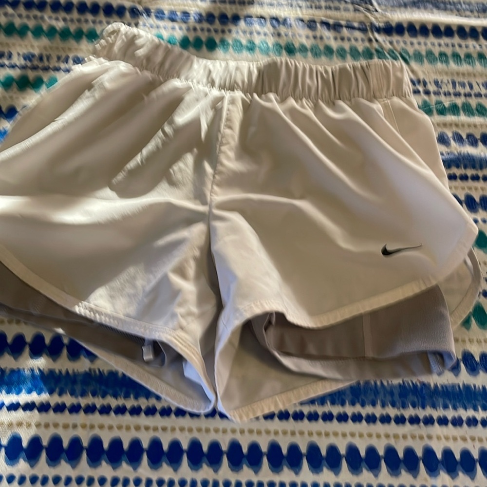 Gray tight shorts with shorts over the top of them one piece